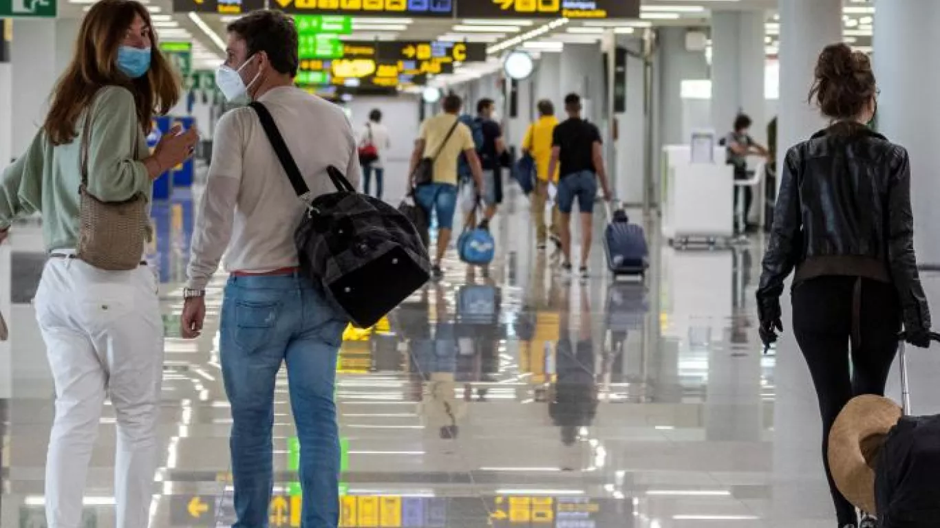 Viajeros en Aeropuerto